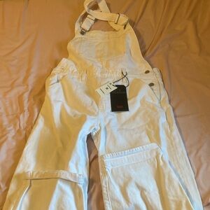 NEW Levi’s white jean overalls, size M; 28 inches inseam